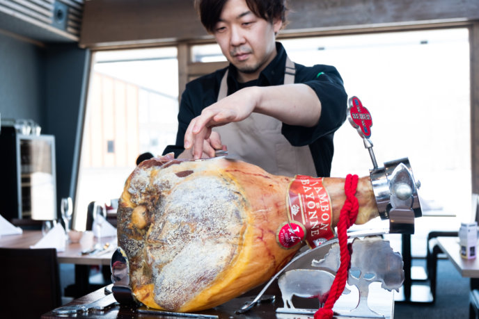 Aged salami sliced at your table