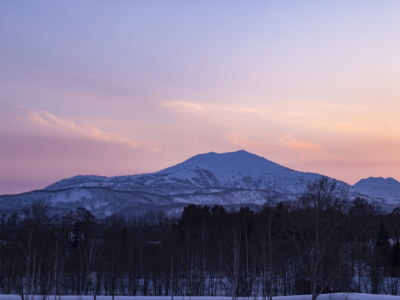 Pink Skies Over Mt  Annupuri As The Night Skiing Lights Come On