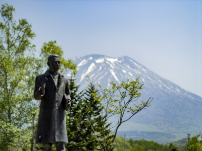 Takeo Arishima Statue At The Arishima Memorial Museum Mt Yotei Background Blue Skies May Spring