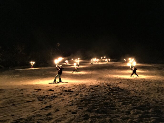 Torchlight skiing